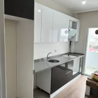 Turak-Mobilya-12-Mutfak-Dolabi-Modelleri-Akrilik-Mutfak-Dolabi-Mutfak-Dolabi-Renkleri-Lak-Panel-Mutfak-Dolabi-High-Gloss-Mutfak-Dolabi-Kulpsuz-Mutfak-Dolabi